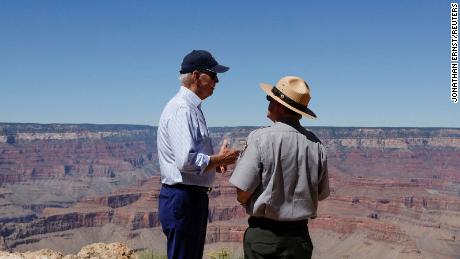 Biden speaks with Ed Keable, superintendent of Grand Canyon National Park, on Tuesday.