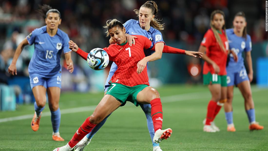 Morocco&#39;s Ghizlane Chebbak and France&#39;s Sandie Toletti compete for the ball. 