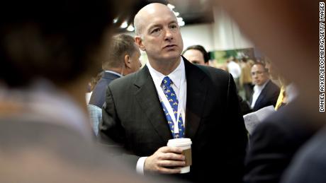 In this 2010 photo, David Sokol speaks to shareholders on the exhibition floor prior to the Berkshire Hathaway Inc. annual meeting in Omaha, Nebraska.
