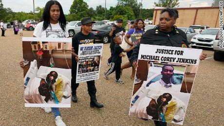 Activists march towards the Rankin County Sheriff&#39;s Office in Brandon, Mississippi, on Wednesday, July 5, 2023, after five former deputies and one former Richland police officer were accused of assaulting two Black men.