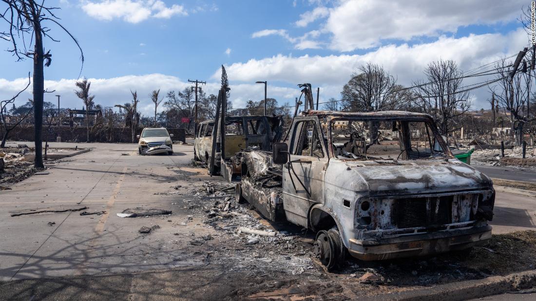 Burned cars sit in Lahaina on August 10.