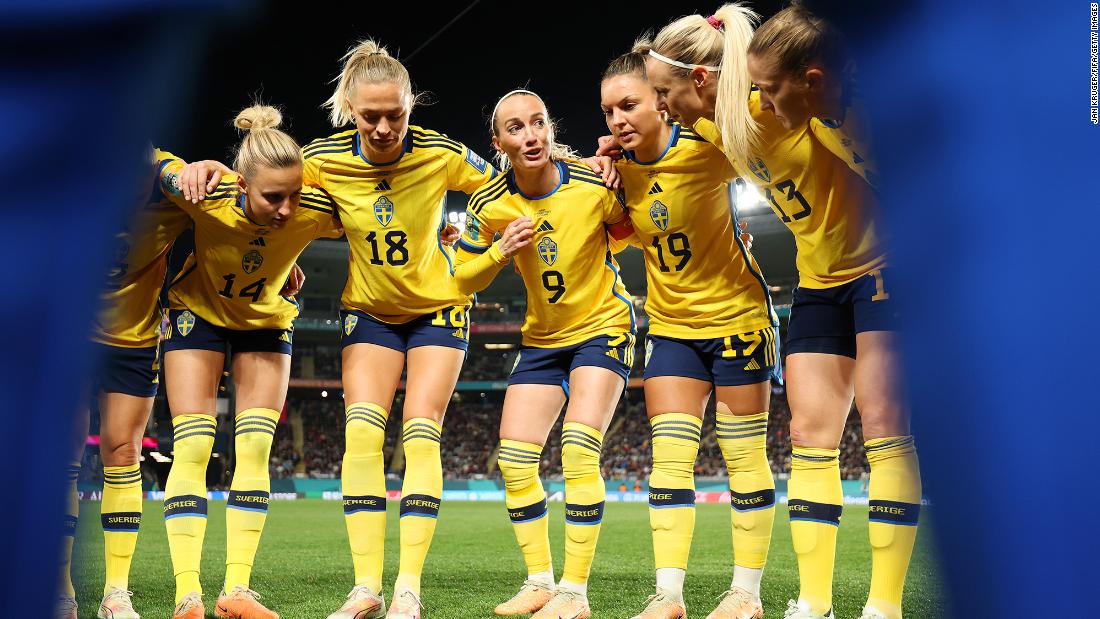 Swedish captain Kosovare Asllani talks to her teammates prior to playing Japan.