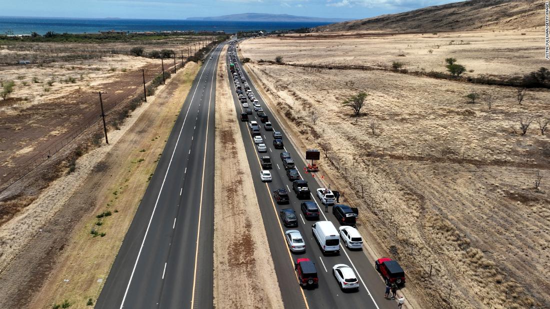 Cars are backed up on the Honoapiilani Highway as residents are allowed back into wildfire-affected areas on August 11.