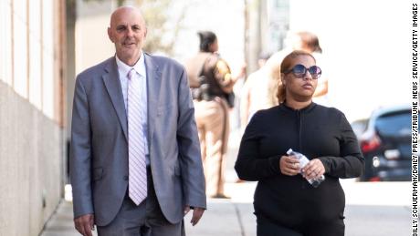 Deja Taylor arrives with attorney James Ellenson at the Newport News Sheriff&#39;s Office in April.