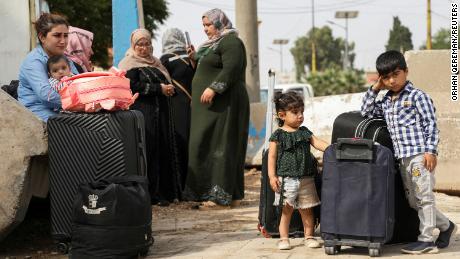 Syrians who were evacuated from Sudan arrive in Qamishli, northern Syria, on May 22. Many Syrians who fled to Sudan after the civil war in 2011 have found themselves displaced again.