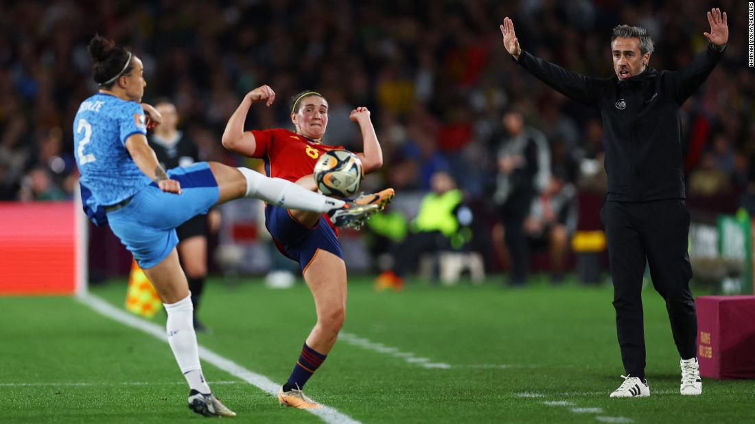 Spanish coach Jorge Vilda reacts as England&#39;s Lucy Bronze, left, and Spain&#39;s Mariona Caldentey compete for the ball in the second half of the final.