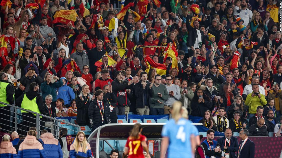 Spanish fans celebrate as the teams leave the field at halftime.
