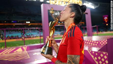 Jennifer Hermoso kisses the Women&#39;s World Cup trophy.