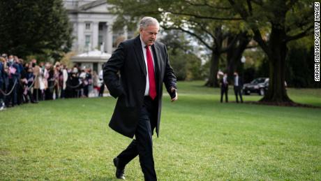 Then-White House Chief of Staff Mark Meadows walks along the South Lawn before President Donald Trump departs from the White House on October 30, 2020 in Washington, DC. 