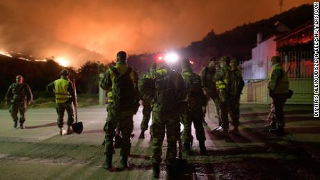 Firefighters battle a wildfire at Loutra Alexandroupolis, Thrace, northern Greece, on 19 August 2023. 