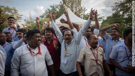 Employees of the Indian Space Research Organisation (ISRO) celebrate after the successful landing of the Chandrayaan-3 mission. 