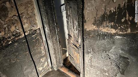 Fire damage is shown at the Glasgow tenement block where Carina Haouchine used to live.