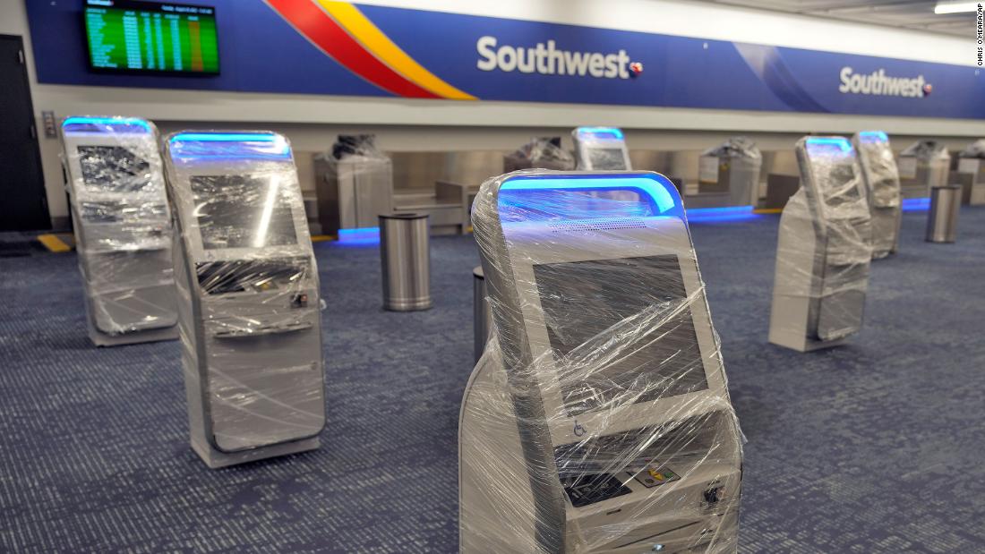 Kiosks at the Southwest Airlines ticket counter are covered in protective wrapping at the Tampa International Airport on August 29. All flights from the airport &lt;a href=&quot;https://www.cnn.com/2023/08/29/business/flight-delays-cancellations-hurricane-idalia/index.html&quot; target=&quot;_blank&quot;&gt;were canceled for the day&lt;/a&gt;.