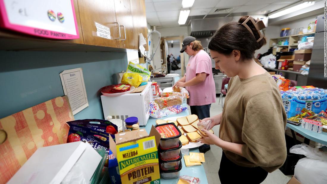 Samarra Mullis, right, and Jack Lemburg make sandwiches for residents who sought shelter at St. Michael&#39;s and All Angels Episcopal Church in Savannah, Georgia, on August 30.