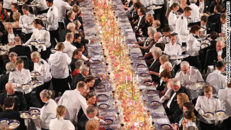 Waiters serve dessert during the Nobel Prize banquet on December 10, 2022. Russia and Belarus were not invited to that year&#39;s event.