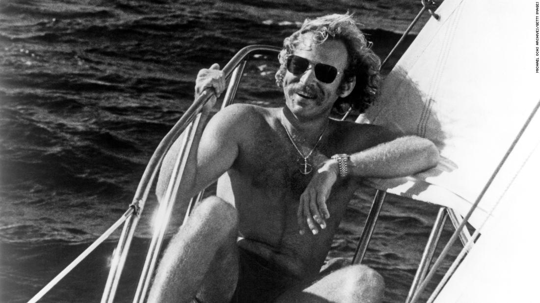 Buffett poses for a photo on his sailboat in 1975.