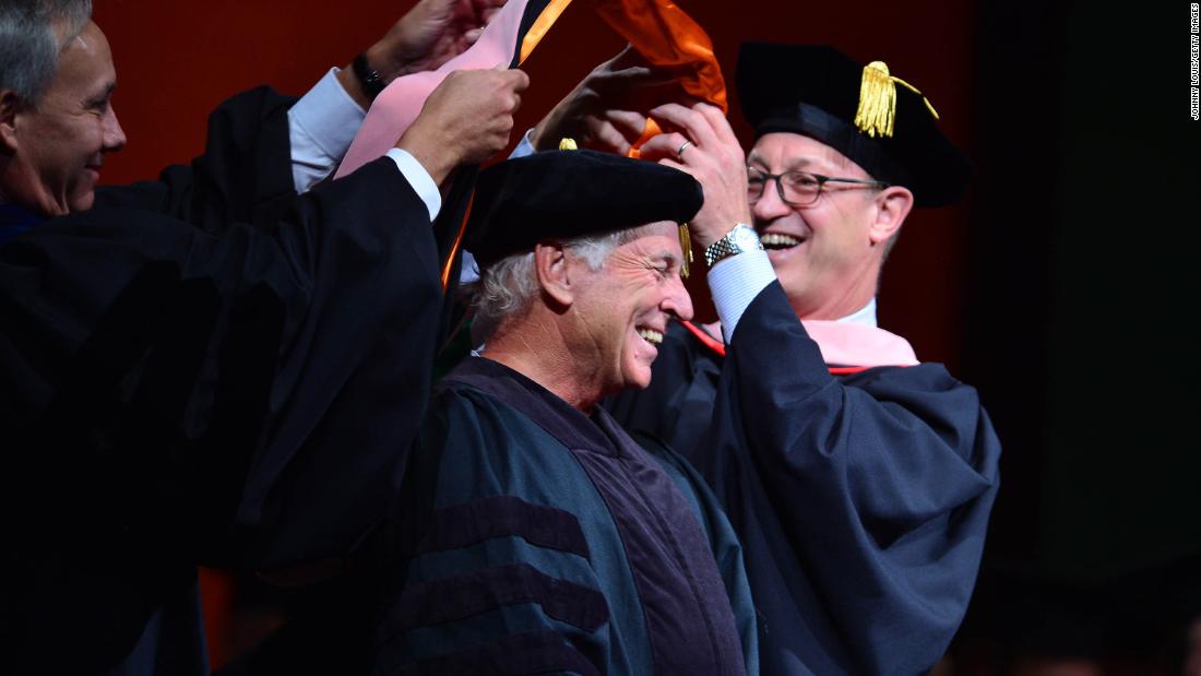 Buffett receives an honorary doctorate in music from the University of Miami in 2015. 