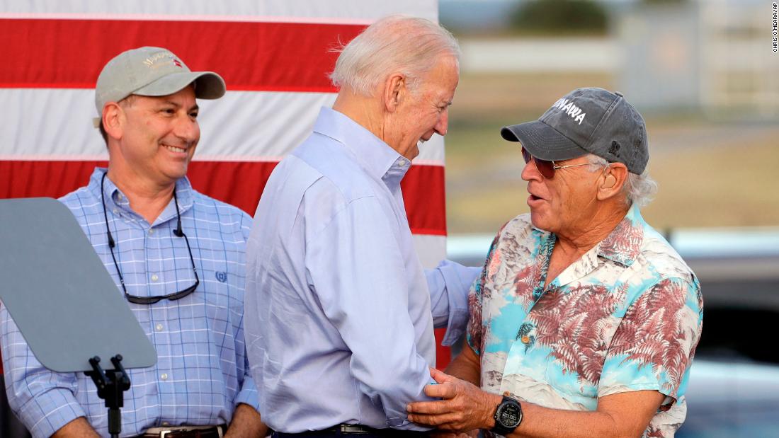 Vice President Joe Biden shakes hands with Buffett at a campaign event for presidential candidate Hillary Clinton in 2016.