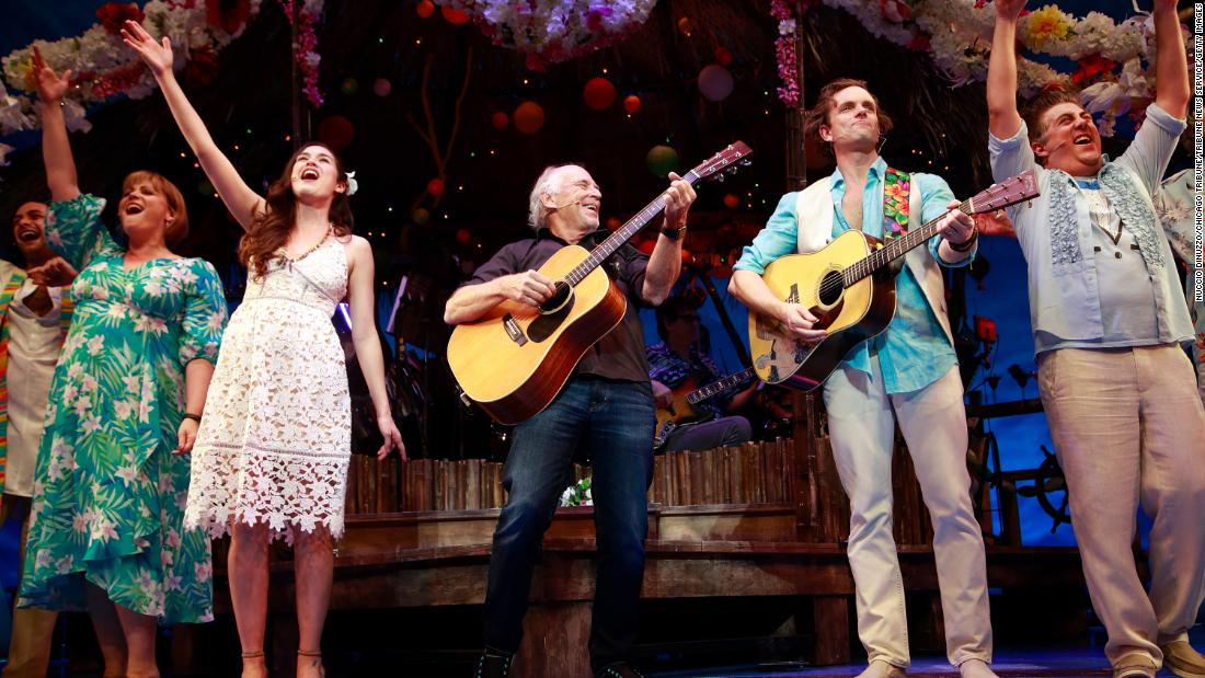Jimmy Buffett surprises theatergoers during the curtain call for &quot;Escape to Margaritaville,&quot; a musical based on Buffett&#39;s songs, in 2017. 