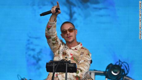 Diplo hitchhiked ride out of rain-drenched Burning Man after walking miles &#39;through the mud&#39; and actually made it to his DC concert