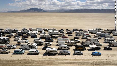 Thousands of people waited hours Monday to leave Burning Man in Nevada&#39;s Black Rock City. 
