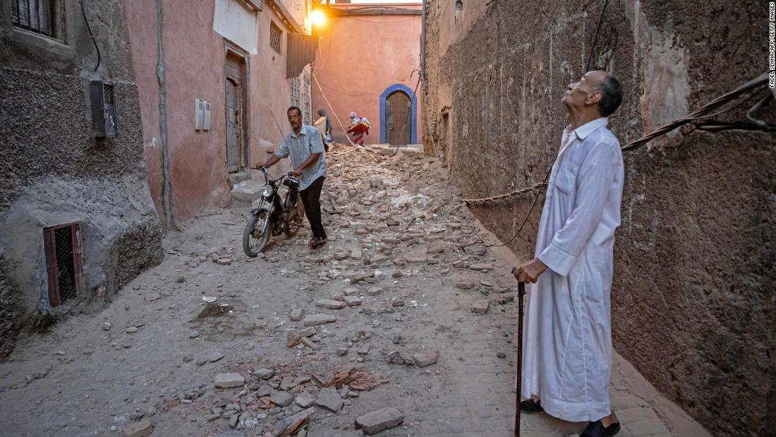 A resident looks at a damaged building in Marrakesh on September 9.