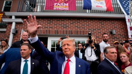 In Iowa, Trump and DeSantis take the campaign to the tailgate tent 