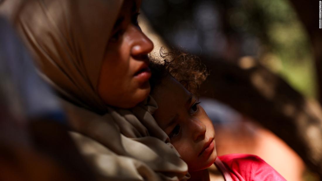 A woman and a child rest in Tinmel, Morocco, on September 11.