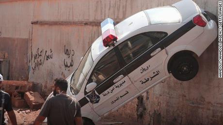 A damaged police car in Derna, Libya, on September 11, 2023.