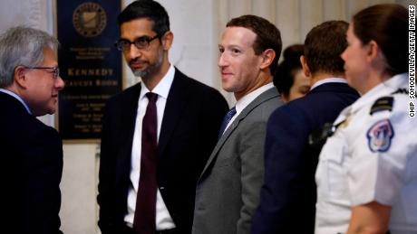 (L-R) NVIDIA CEO Jensen Huang, Google CEO Sundar Pichai and Meta CEO Mark Zuckerberg visit before attending the &quot;AI Insight Forum&quot; outside the Kennedy Caucus Room in the Russell Senate Office Building on Capitol Hill on September 13, 2023 in Washington, DC. Lawmakers are seeking input from business leaders in the artificial intelligence sector, and some of their most ardent opponents, for writing legislation governing the rapidly evolving technology. 