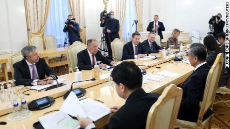 Russia&#39;s Foreign Minister Sergei Lavrov meets with his Chinese counterpart Wang Yi in Moscow on Monday.