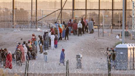 A file photo of migrants waiting at the border in El Paso, Texas.