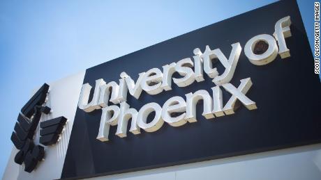 A sign marks the location of the University of Phoenix Chicago campus on July 30, 2015, in Schaumburg, Illinois.