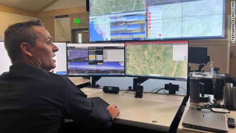 Scott Slumpff, Cal Fire&#39;s battalion chief of the intel program, monitors for anomalies identified by AI to confirm if it is smoke from a wildfire or something else.