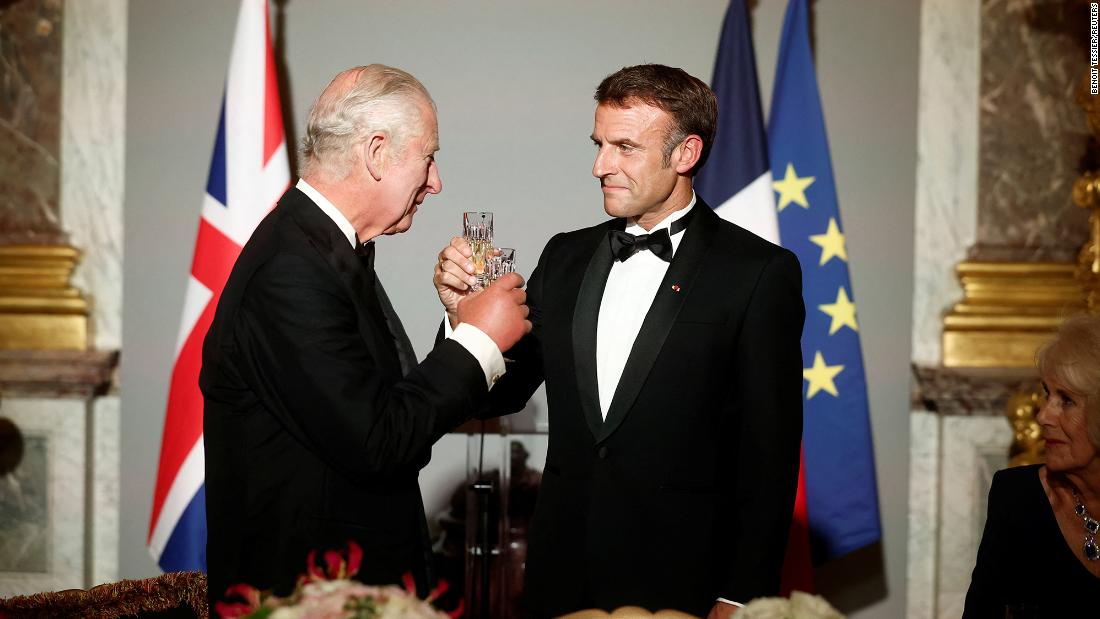 The King shares a toast with French President Emmanuel Macron during a state dinner at the Palace of Versailles in Versailles, France, in September 2023. It was the first day of &lt;a href=&quot;https://edition.cnn.com/2023/09/20/europe/king-charles-france-state-visit-intl/index.html&quot; target=&quot;_blank&quot;&gt;Charles&#39; state visit to France&lt;/a&gt;.