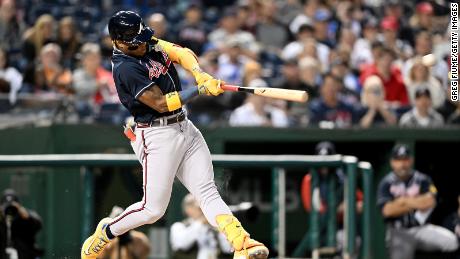 WASHINGTON, DC - SEPTEMBER 22: Ronald Acuna Jr. #13 of the Atlanta Braves hits a home run in the first inning against the Washington Nationals at Nationals Park on September 22, 2023 in Washington, DC. The home run was Acuna&#39;s 40th of the season. (Photo by Greg Fiume/Getty Images)