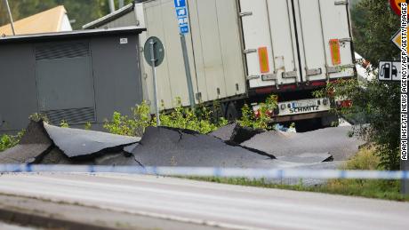 A truck is seen in the debris of a street near Stenungsund, Sweden, on September 23, 2023.