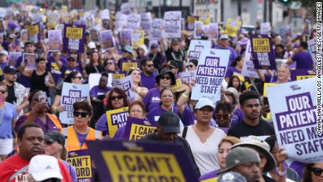 Healthcare workers take part in a rally at Kaiser Permanente&#39;s main medical facility on Monday, Sept. 4, 2023 in Los Angeles, CA. 