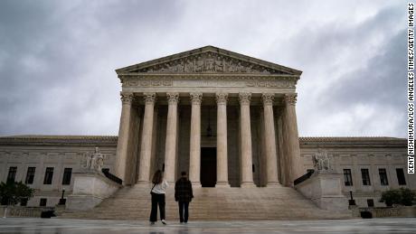 People visit the plaza in front of the Supreme Court of the United States on Wednesday, Oct. 5, 2022 in Washington, DC.