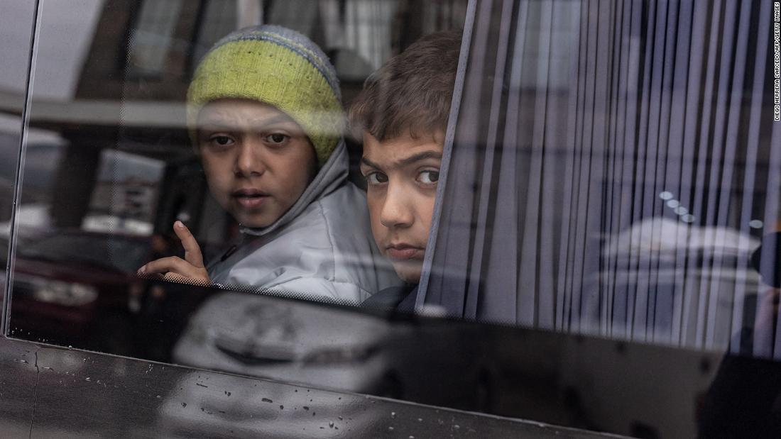 Young ethnic Armenians from Nagorno-Karabakh in the town of Goris during evacuations to Armenia on October 1.