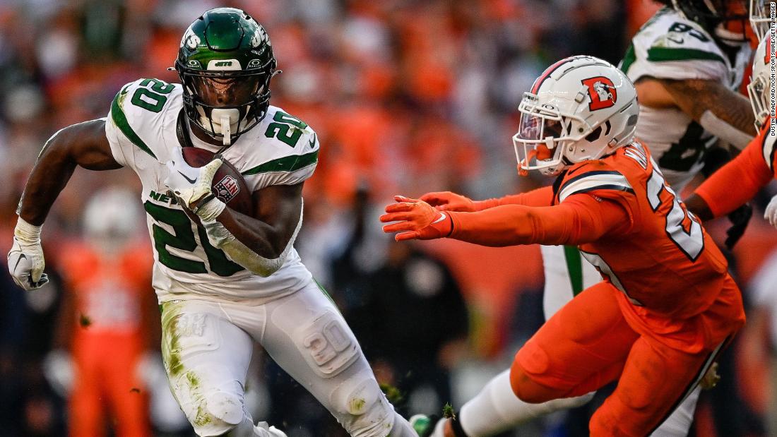 New York Jets running back Breece Hall carries the ball during a game against the Denver Broncos on October 8. The Jets won 31-21.