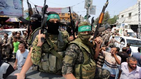 Palestinian Hamas militants attend the funeral of their comrade in the southern Gaza Strip in August 2017.
