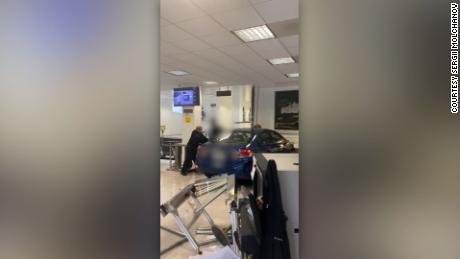 Videos recorded by Sergii Molchanov show the car crashed into the consulate on October 9 and debris scattered on the ground as people ran out of the building.