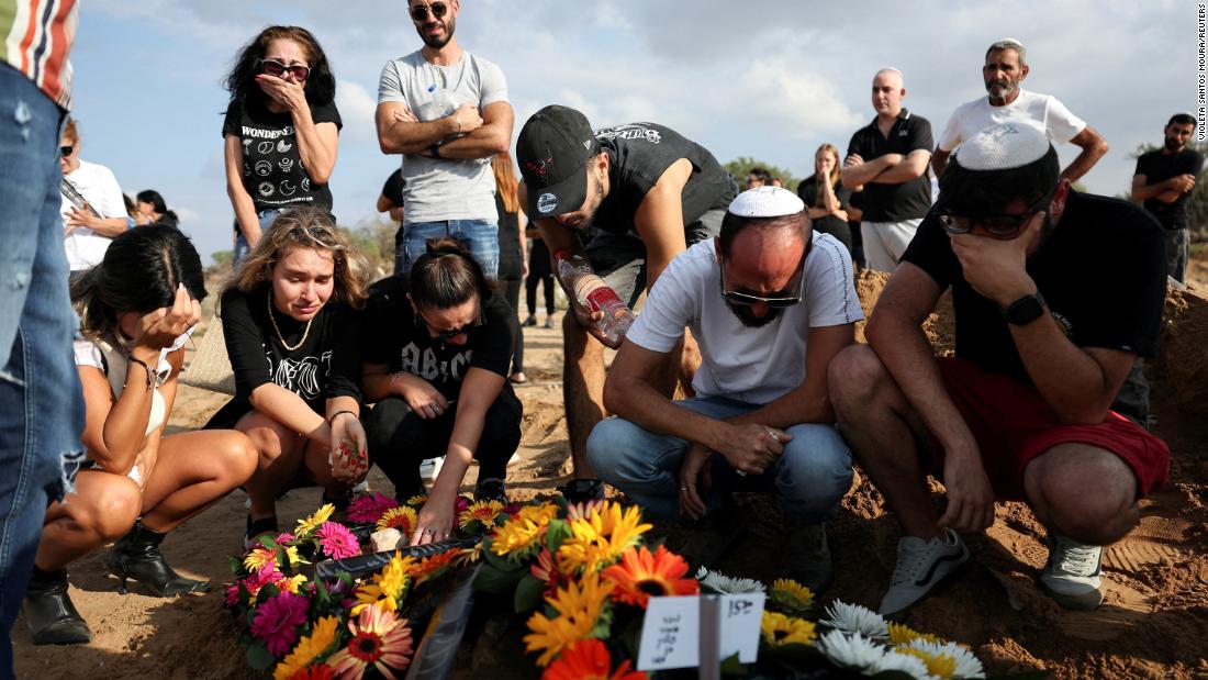 People mourn at the grave of Eden Guez during her funeral in Ashkelon, Israel, on October 10. She was killed as she attended a music festival that was &lt;a href=&quot;https://www.cnn.com/2023/10/07/middleeast/israel-gaza-fighting-hamas-attack-music-festival-intl-hnk/index.html&quot; target=&quot;_blank&quot;&gt;attacked by terrorists from Gaza&lt;/a&gt;. Israeli officials counted at least 260 bodies at the Nova Festival.