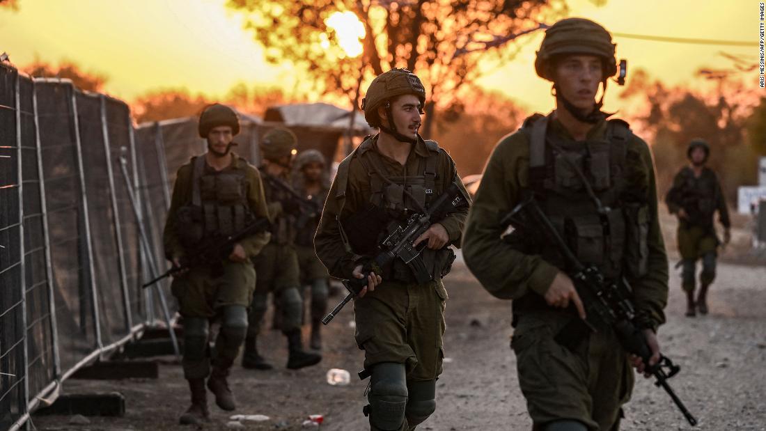 Israeli soldiers patrol near Kibbutz Be&#39;eri, Israel, on October 12.