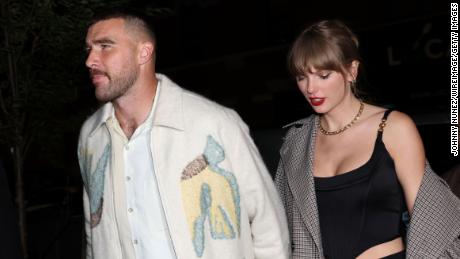 Taylor Swift and Travis Kelce&#39;s whirlwind week caps off with &#39;SNL&#39; cameos -- and some hand-holding
