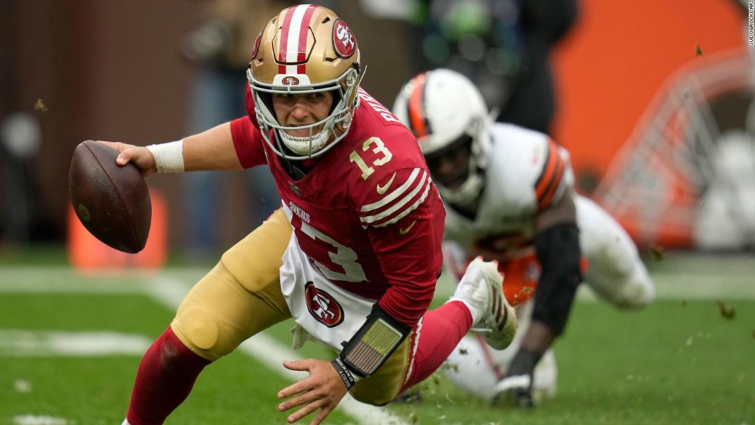 San Francisco 49ers quarterback Brock Purdy scrambles away from Cleveland Browns linebacker Jeremiah Owusu-Koramoah during the second half of the 49ers&#39; 19-17 loss on Sunday, October 15.
