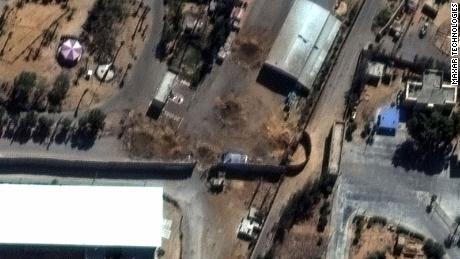 A satellite photo provided by MAXAR Technologies shows four 30-foot craters blocking the roadway at the Rafah border crossing closest to the Egyptian gate. 