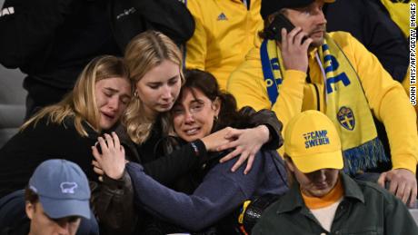 Swedish supporters react as they wait in the stand during the Euro 2024 qualifying match. 