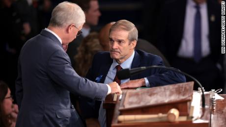 Rep. Jim Jordan talks to Speaker Pro Tempore Rep. Patrick McHenry as the House of Representatives prepares to hold a vote on a new Speaker of the House at the Capitol on October 18, 2023 in Washington, DC. 